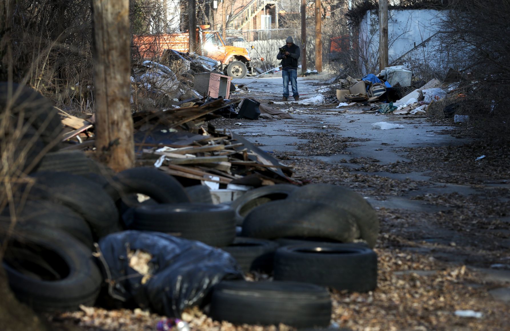 Foreman Tony Stokes discovered a trash-filled alley while responding to a complaint